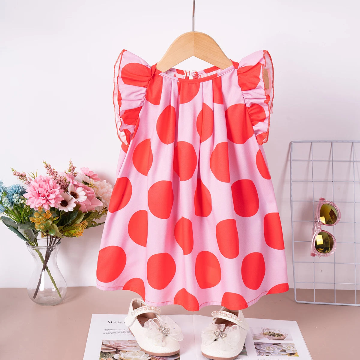 Summer children's wear adorable and sweet dresses featuring charming floral prints, fashionable and trendy girls clothing