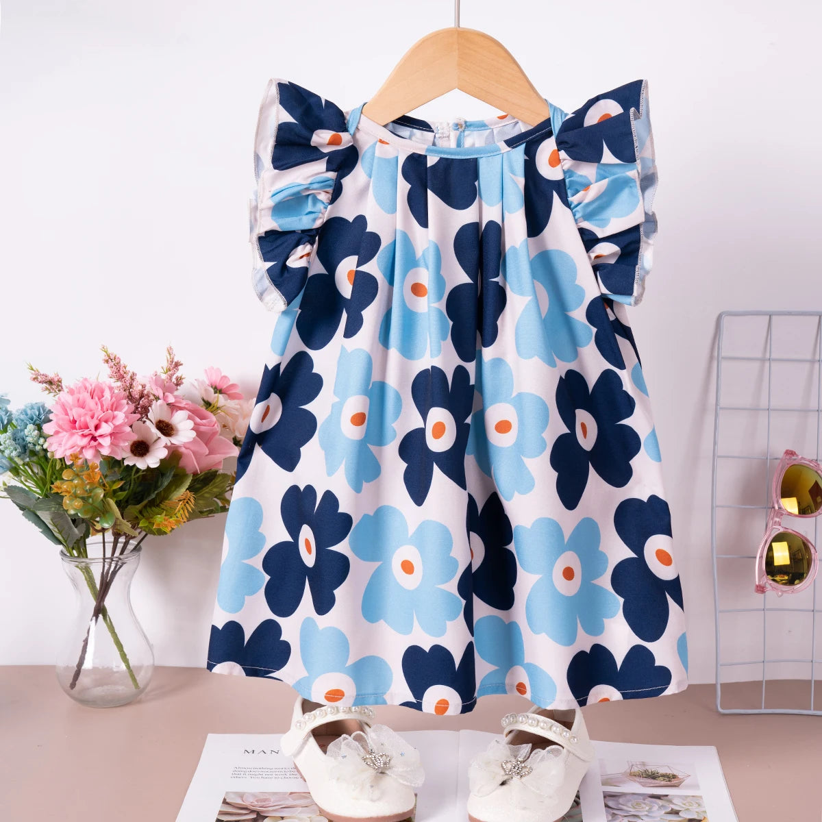 Summer children's wear adorable and sweet dresses featuring charming floral prints, fashionable and trendy girls clothing